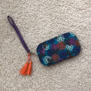Claire’s adorable wristlet.💜🧡💙
